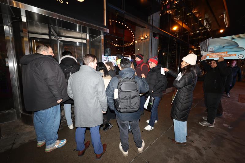 World Animal Protection staff and volunteers protesting outside of Groupon’s company holiday party at its Chicago headquarters.